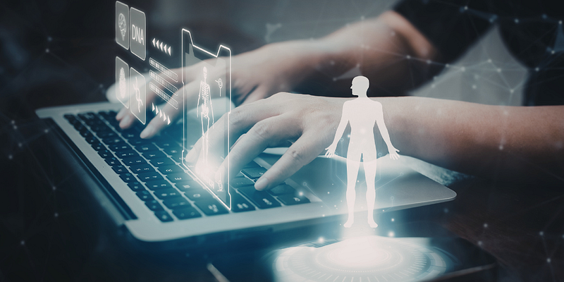 hands on a computer keyboard with images of virtual clones appearing